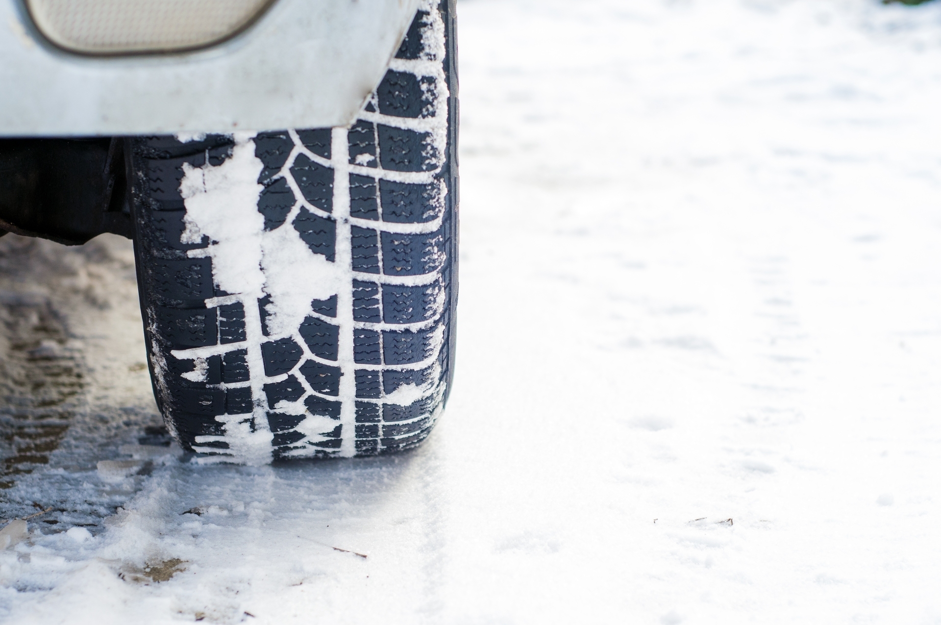 car-tires-winter-road-covered-with-snow-vehicle-snowy-alley-morning-snowfall